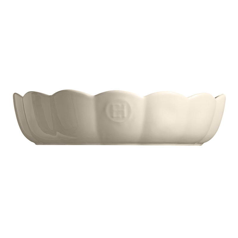 Seitenansicht Kuchenform MADELEINE von Emile Henry mit Logo und Wellenrand