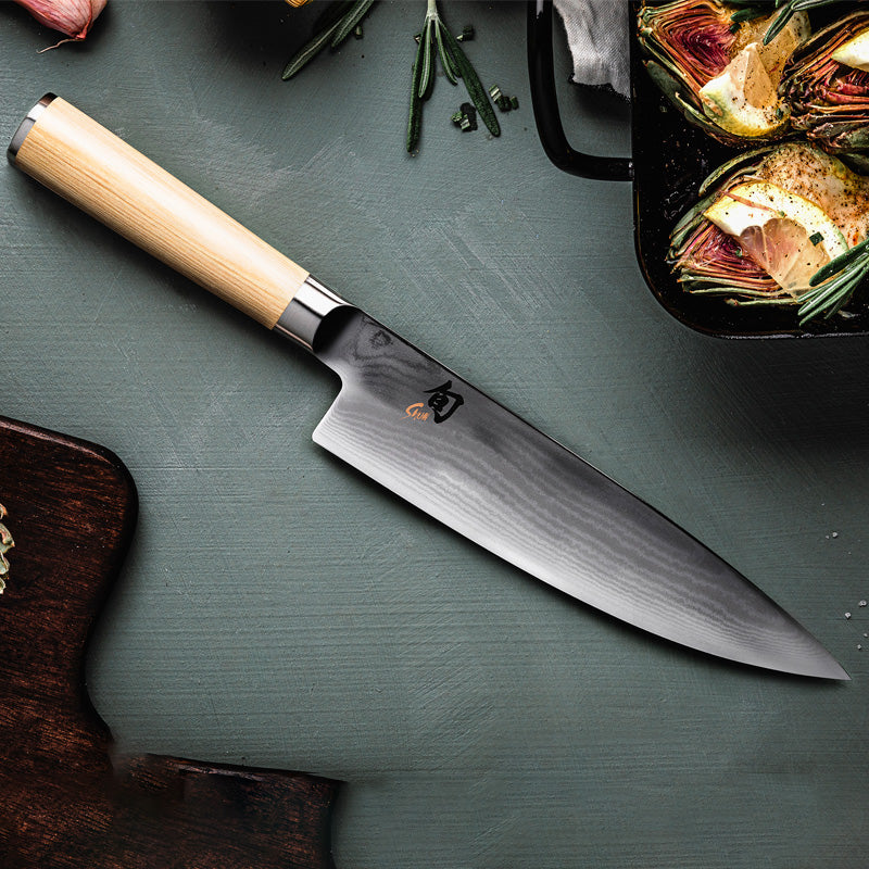 Logo auf dem Kochmesser von KAI
Serie: Shun Classic White