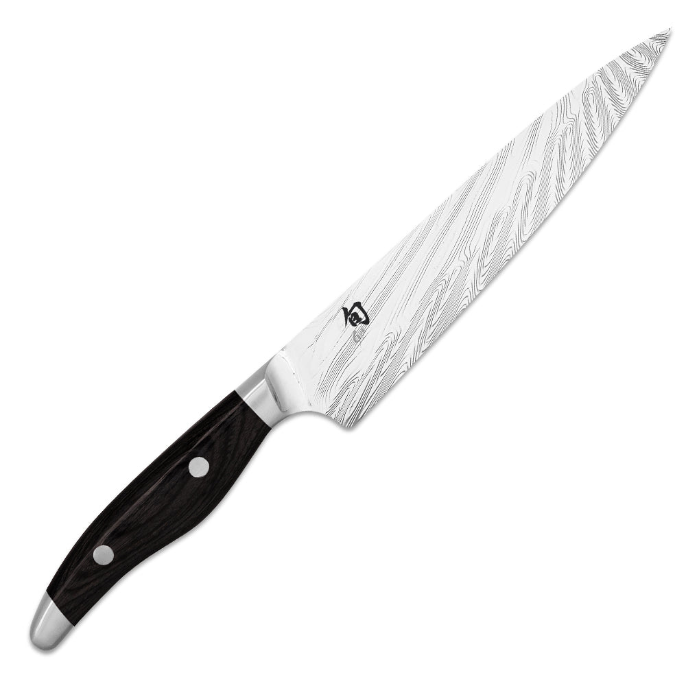 Allzweckmesser von KAI - Serie: Shun Nagare Black, Grifflänge: 11,5 cm, Klingenlänge: 15 cm, handgefertigt, Griff aus schwarzem Pakkaholz.
Online-Shop Home-and-Kitchen.de

