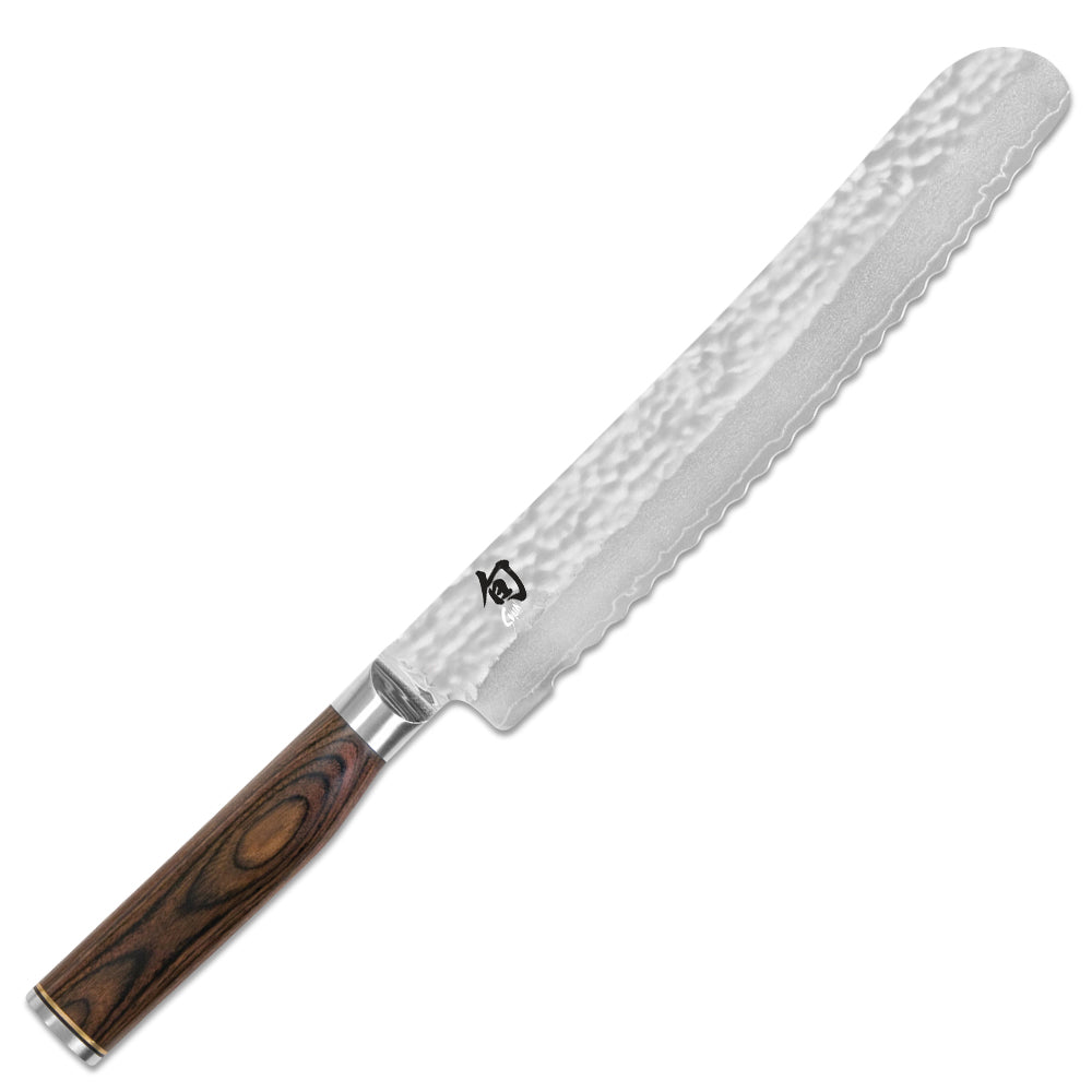 Brotmesser von KAI - Serie: Shun Premier Tim Mälzer, mit Wellenschliff, Grifflänge: 12,5 cm, Klingenlänge 23 cm, Schliff beidseitig für Rechts- und Linkshänder geeignet, Griff aus Pakkaholz, braun-meliert
Online-Shop Home-and-Kitchen.de