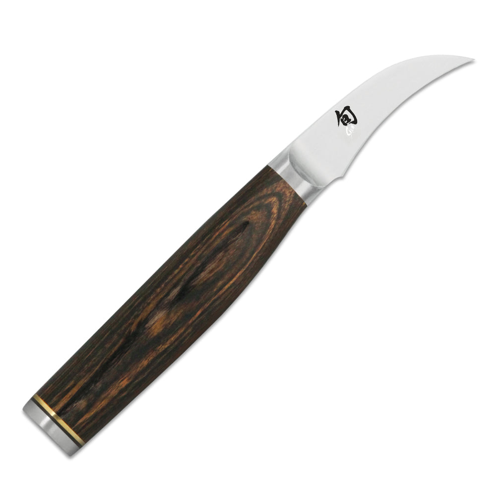 Schälmesser von KAI - Serie: Shun Premier Tim Mälzer, beidseitig geschliffen, mit gebogener Klinge,  Gewicht 61 g, handgefertigt in Japan,
Griff: Pakkaholz, braun-meliert
Online-Shop Home-and-Kitchen.de