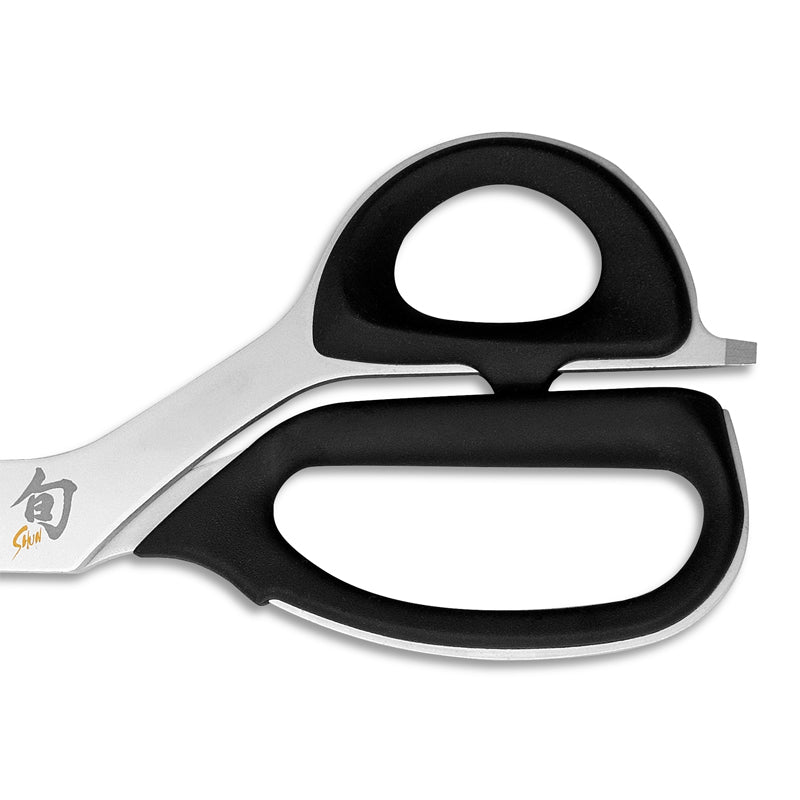 Haushaltsschere von KAI, Serie: SHUN
ergonomische Griffe aus Elastomer-Kunststoff, zwei Zusatzfunktionen wie Knochenkerbe und Kapselheber
zur Reinigung zerlegbar. Online-Shop Home-and-Kitchen.de
