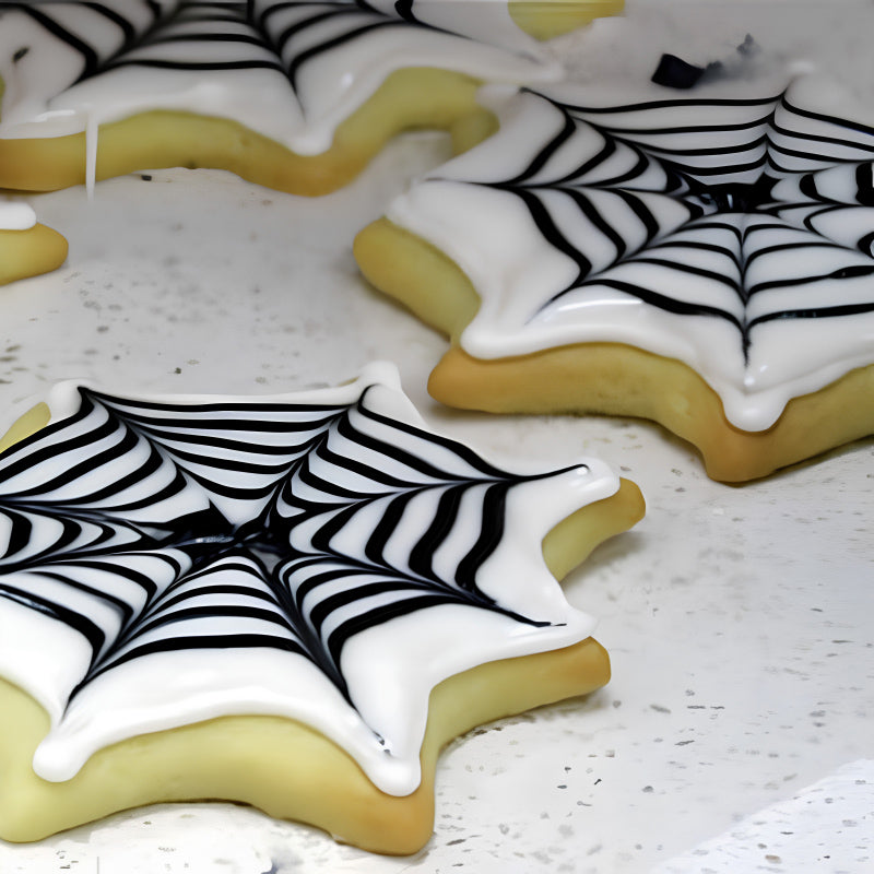 Ausstecher-Set Halloween von Paderno 3 verschiedene Motive: Spinnen, Spinnennetz und Fledermaus,  rostfreier Für süßen oder herzhaften Teig, Marzipan oder Fondant. 
Ausstecher-Set mit 10 Tieren auch im Online-Shop Home-and-Kitchen.de