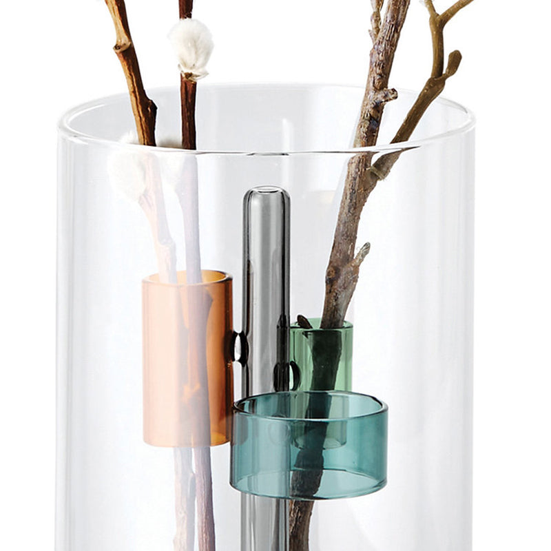 Auch einzelne Zweige sehen in dieser außergewöhnlichen Vase von Philippi Design Vase GIARDINO schön aus, dank der 3 bunten Ringe, die die Zweige festhalten.