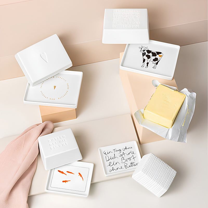Butterdosen von Räder Design in verschiedenen Größen und mit unterschiedlichen Motiven.