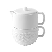 Das weiße Porzellan-Teekannen-Set,  dem Becher mit Henkel und Strickmuster und der Teekanne aus glattem Porzellan mit Deckel ist immer griffbereit und kann mit einem Handgriff zu deiner Teestunde auf dem Sofa getragen werden. Es hat eine Höhe von 14,5 cm und einen Durchmesser von 9,5 cm.  Die Kanne hat ein Volumen von 500 ml und die Tasse von 300 ml.