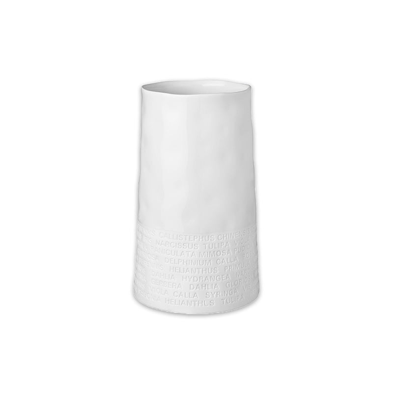 Porzellan-Blumenvase von Räder Design, Oberfläche außen teilglasiert, innen komplett. Höhe 20 cm Durchmesser 10 cm. Schriftzug um Vasenende