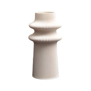 Vase TOWER 2 mit dezentem Rillenmuster, hergestellt im 3D-Verfahren aus 100 % recycelten Materialien hergestellt, mit Glaseinsatz. 
Zu bestellen im Online-Shop Home-and-Kitchen.de