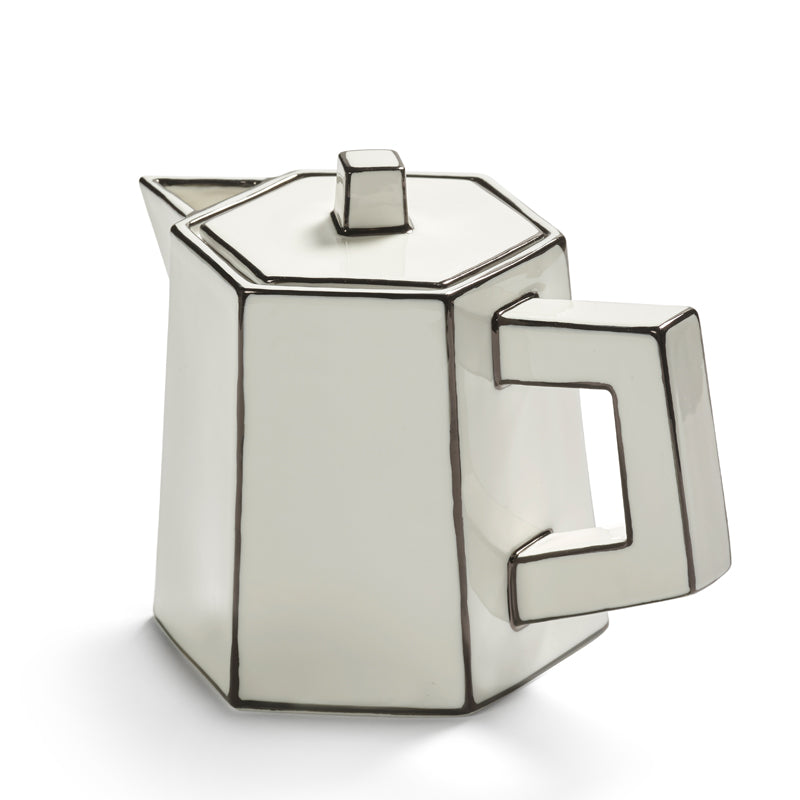 Annebet Philips designte die Teekanne CARTE BLANCHE für Serax. Sie hat schwarze Faltlinien, eckigen Griff und Henkel und ist handbemalt. Online-Shop Home-and-Kitchen.de